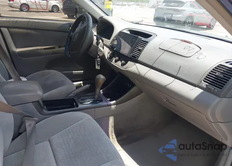 2003 Toyota Camry Le z USA, uszkodzony, nr VIN 4T1BE32KX3U737323